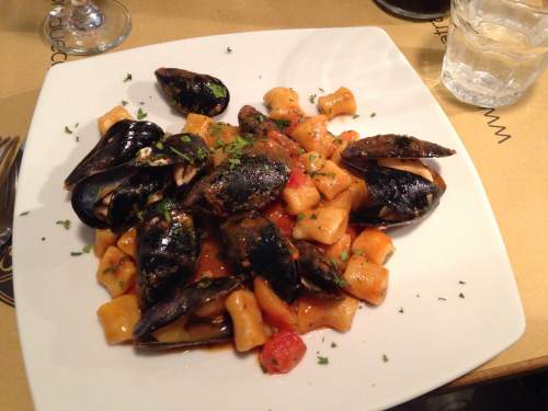 Gnocchi with tomatoes and mussels - divine.