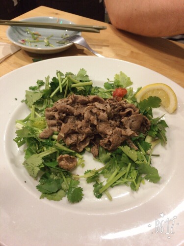 Peppered beef with lime, served on a bed of coriander - mouthwatering!